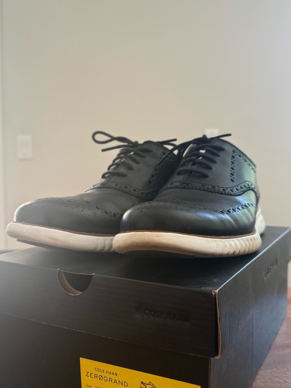 Cole Haan Black Leather Wingtip Oxfords with White Sole